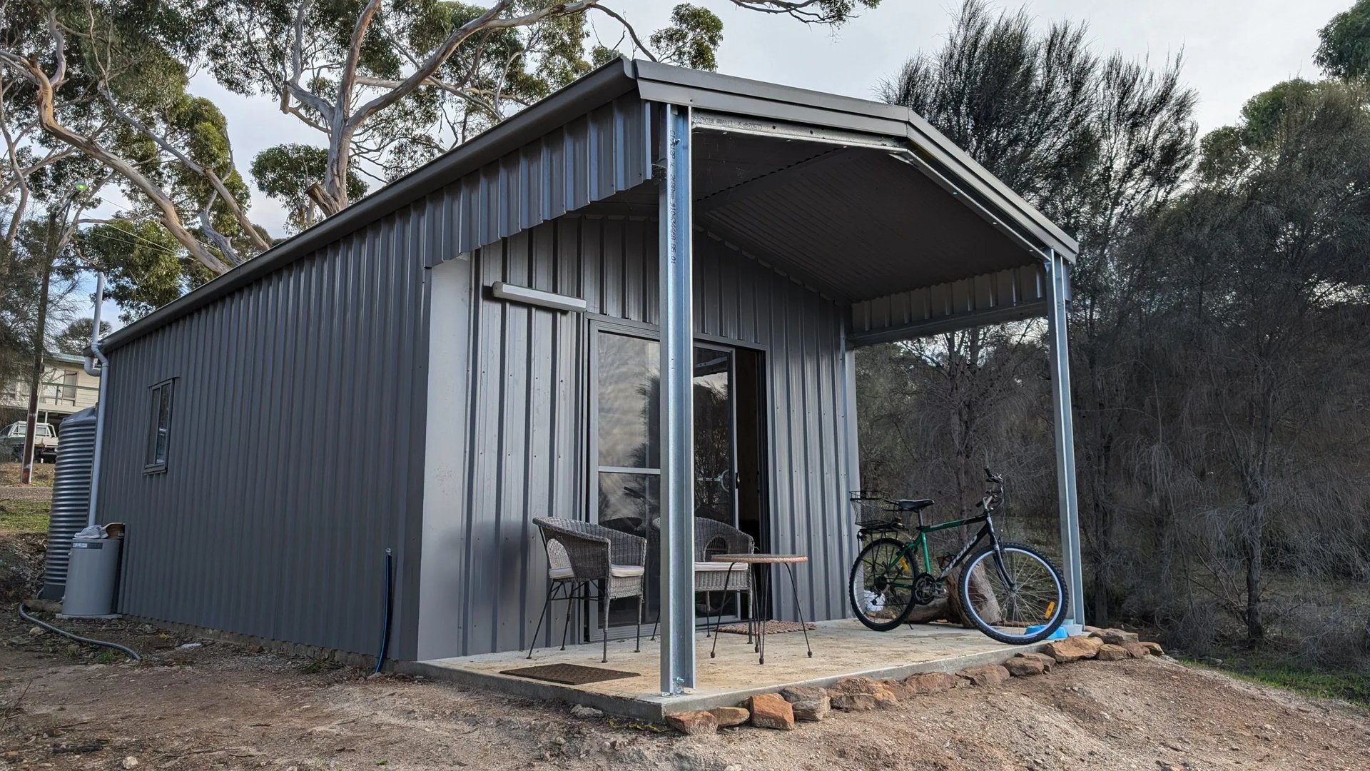 Modern, self-contained cabin with all comforts on rural block with sea views